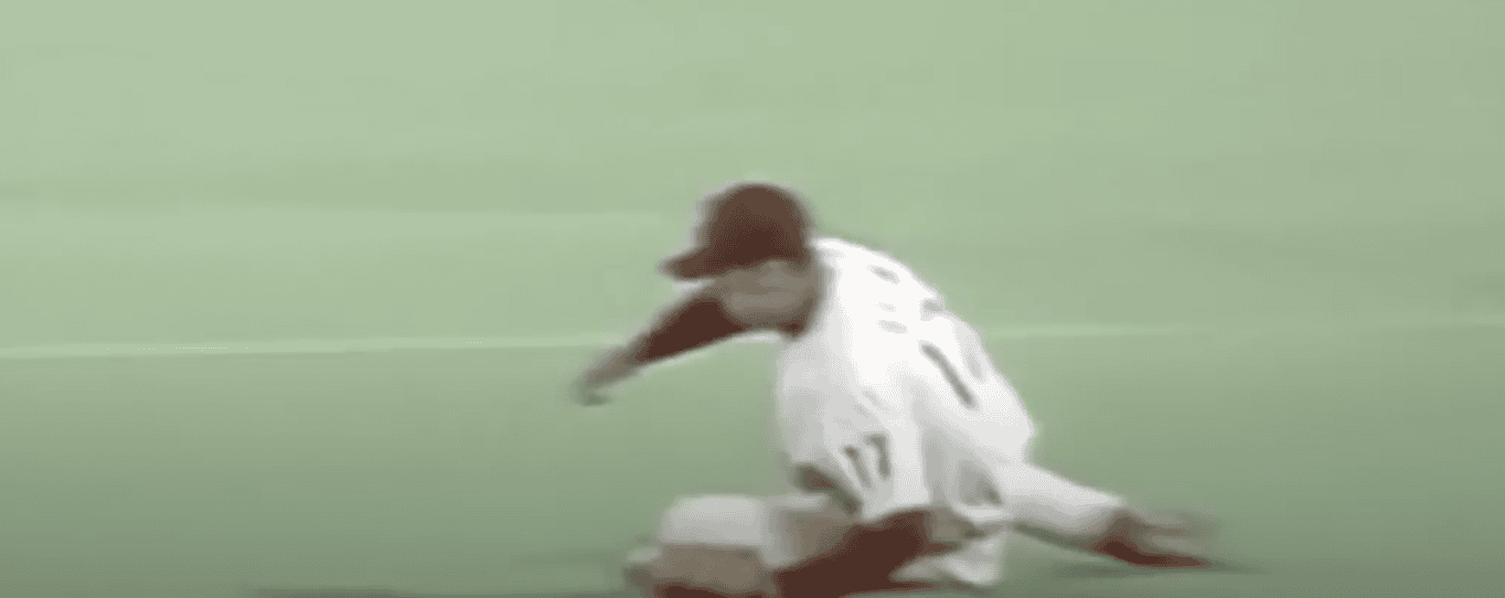 Scott Rolen showcasing his skills, representing the modern third baseman in baseball.